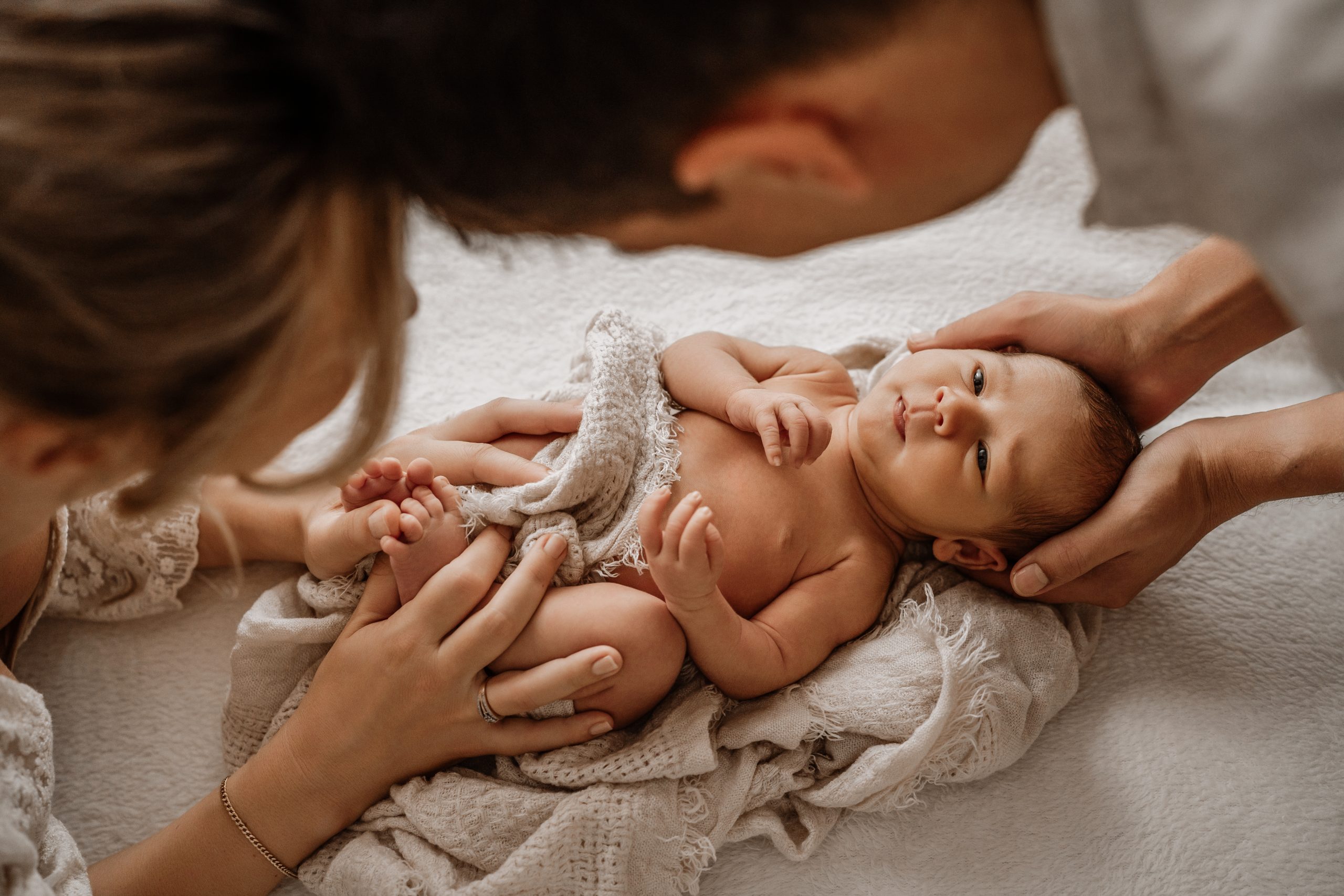 Baby- und Familienshooting Mama und Papa mit Baby
